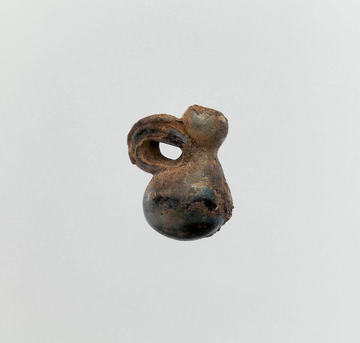 Glass pendant in the form of a miniature jug or gourd, Glass, Roman