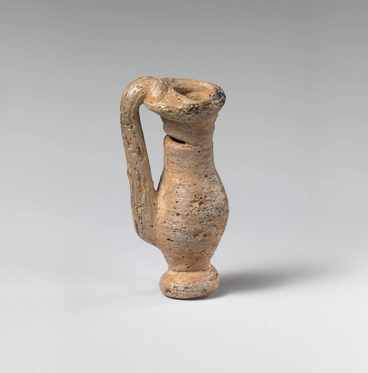 Glass pendant in the form of a miniature jug, Glass, Roman