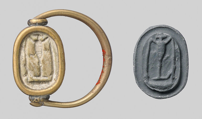Gold ring with glass scarab