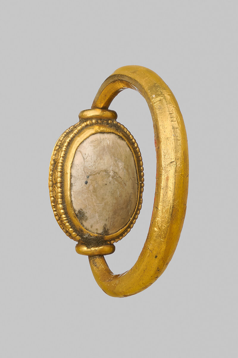 Steatite scaraboid seal set in a gold swivel ring, Steatite, gold, Greek