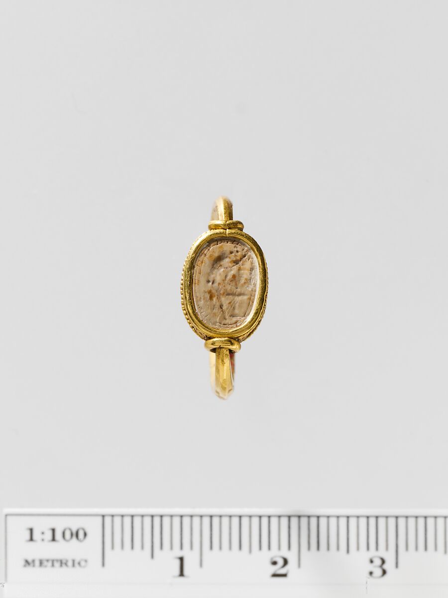 Steatite scaraboid seal set in a gold swivel ring, Steatite, gold, Greek