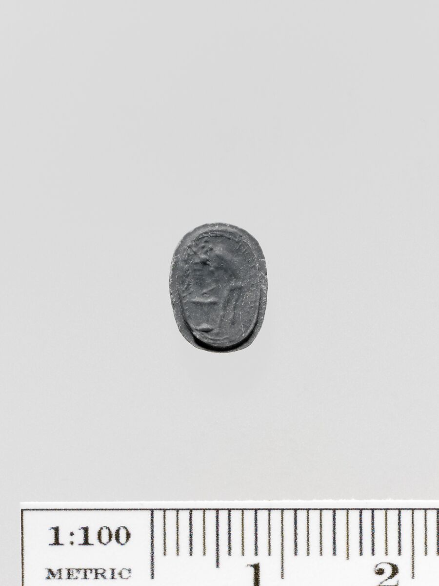 Steatite scaraboid seal set in a gold swivel ring, Steatite, gold, Greek