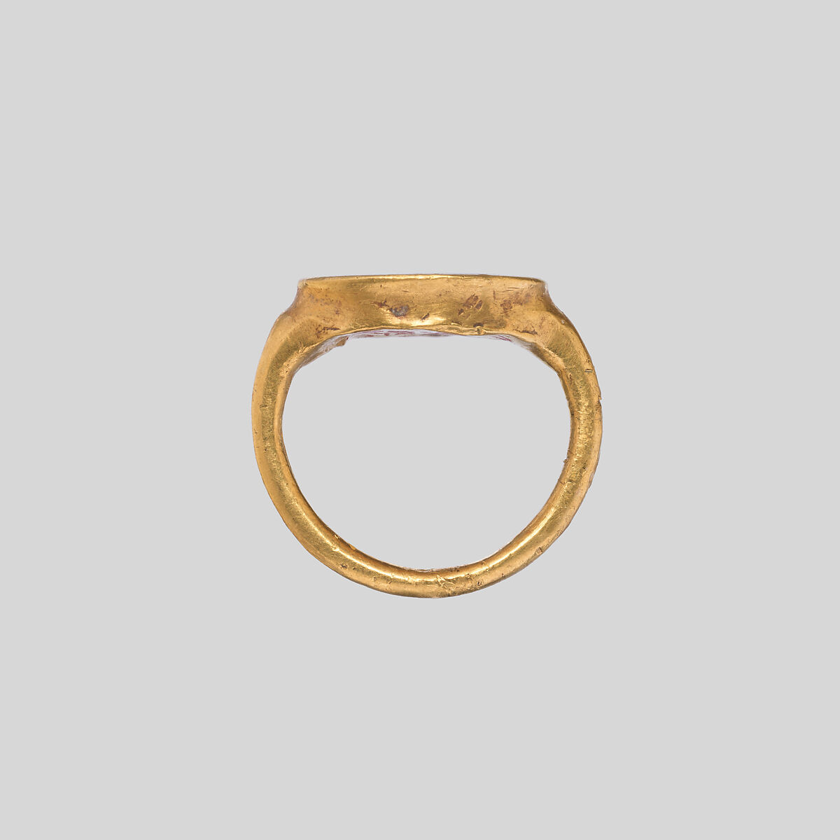 Gold ring with carnelian intaglio: Eros with flaming torch, Carnelian, gold, Roman, Cypriot