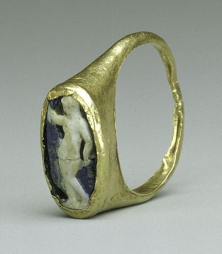 Gold ring with glass cameo in bezel