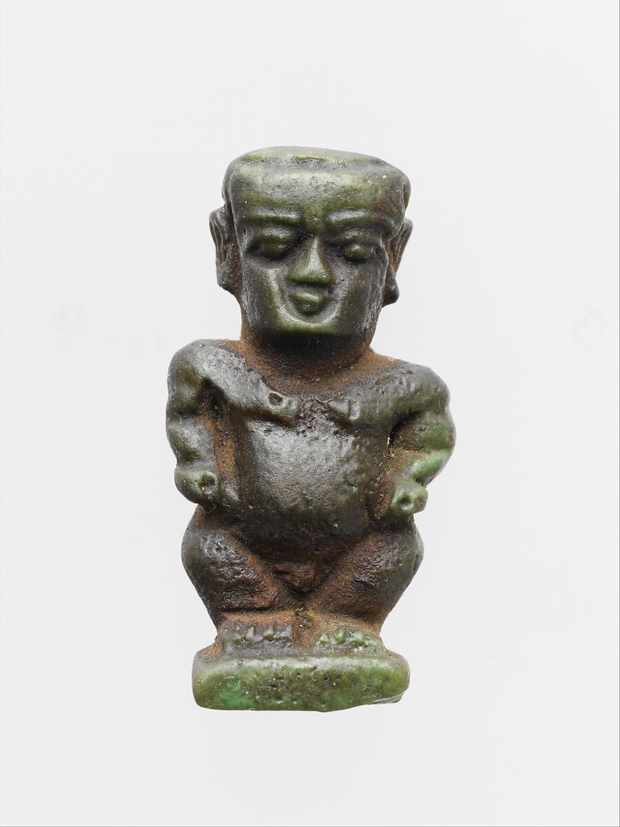 Faience amulet in the form of the dwarf god Pataikos, Clay, glazed, Egyptian 