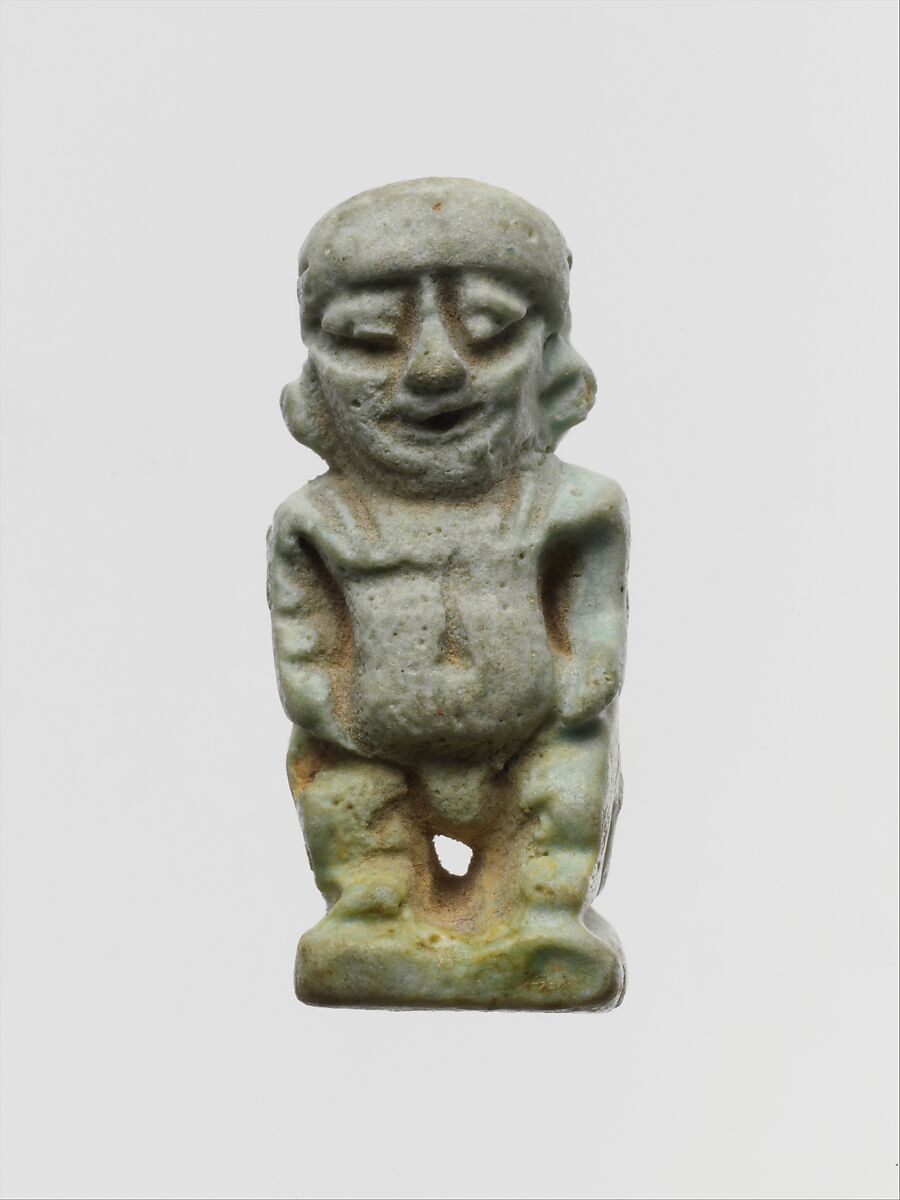 Faience two-sided amulet in the form of the dwarf god Pataikos, Clay, glazed, Egyptian 