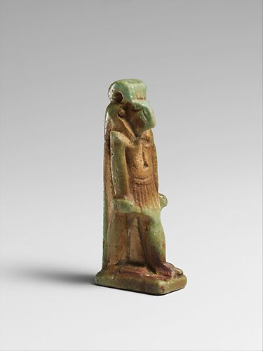 Faience amulet of a ram-headed Amun-re or Khnum