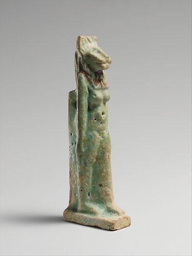 Faience amulet of a goddess with feline head