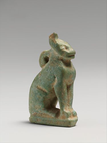 Faience amulet of a seated cat