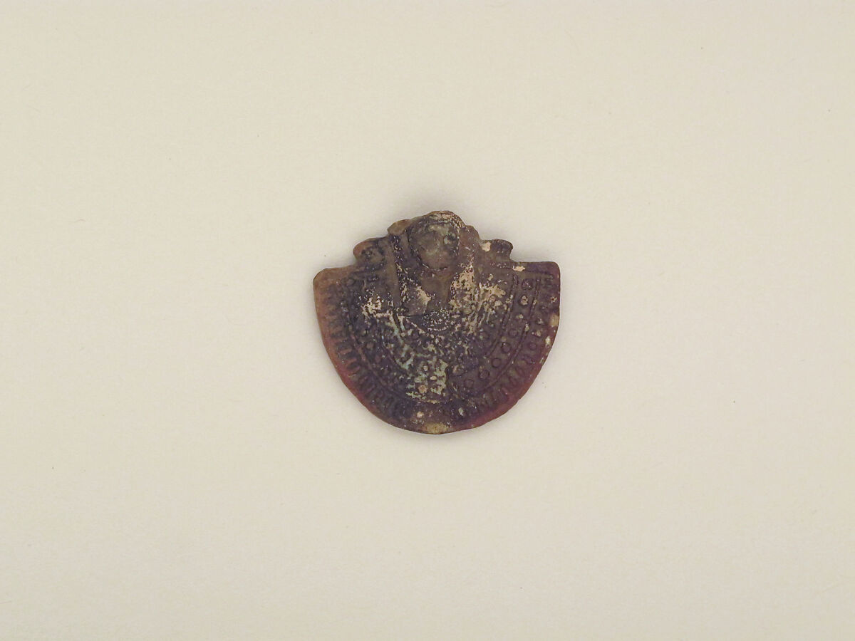 Faience aegis pectoral with lion (?) head, Faience, Egyptian 