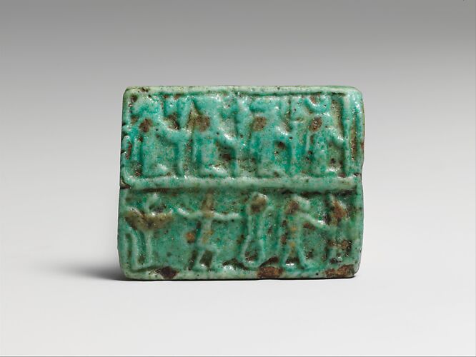 Faience amulet plaque with a group of deities