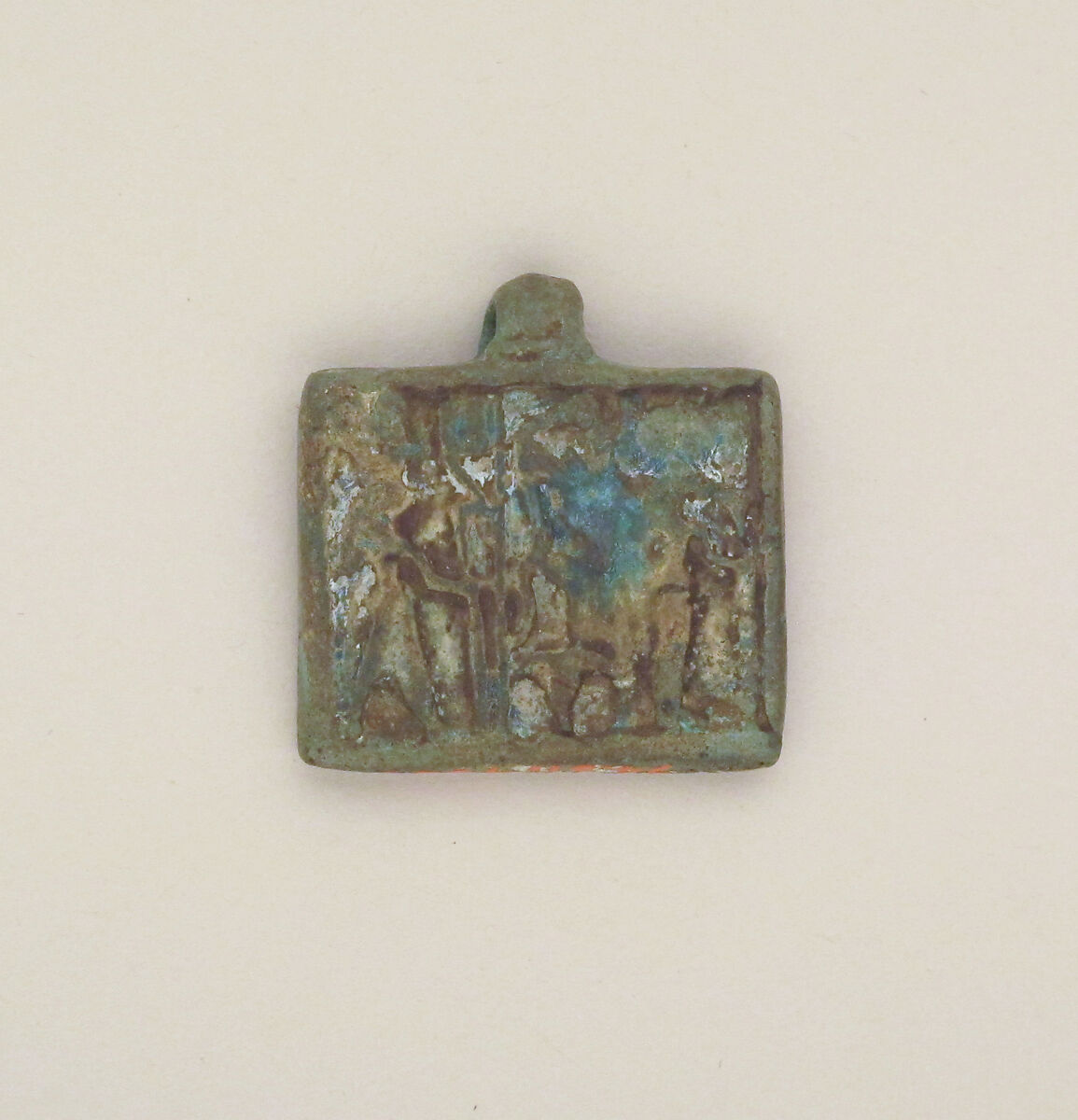 Amulet plaque, group of deities, Clay, glazed 