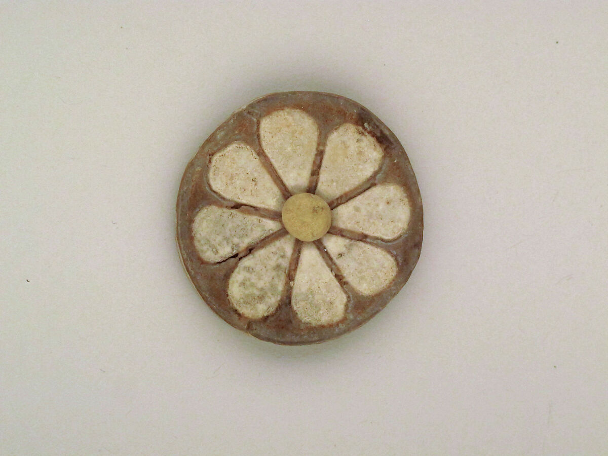 Roundel with daisy pattern, Clay, glazed 