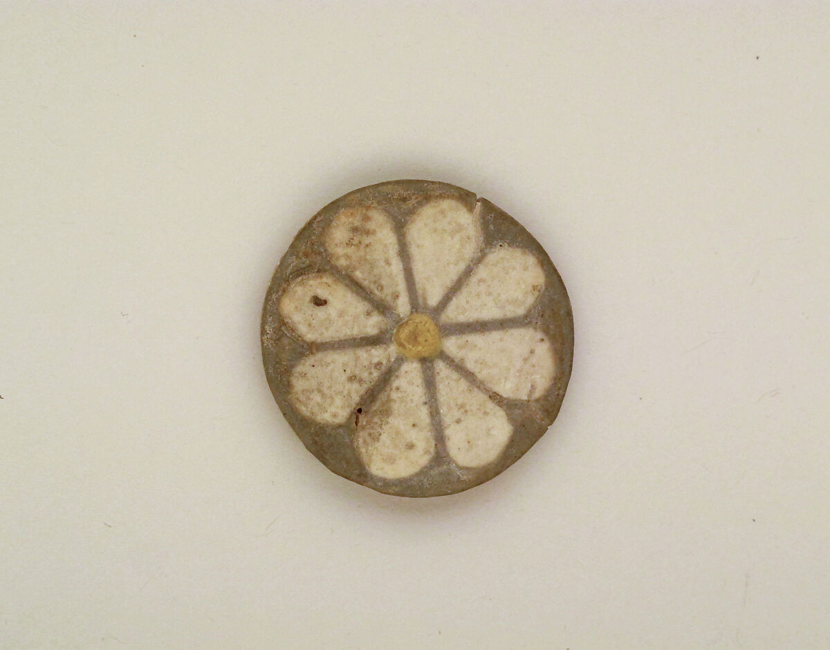 Roundels with daisy pattern, Clay, glazed