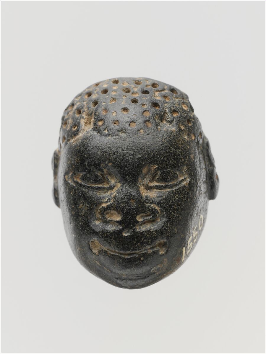 Chlorite pendant in the form of the head of a Black African, Chlorite, Cypriot 