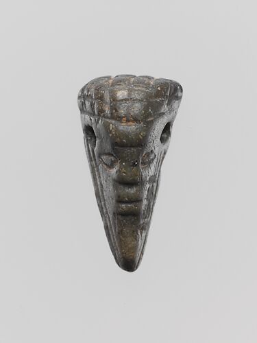 Chlorite pendant in the form of the head of an Assyrian