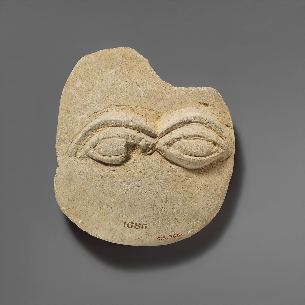 Limestone plaque with two eyes in relief, Limestone, Cypriot 