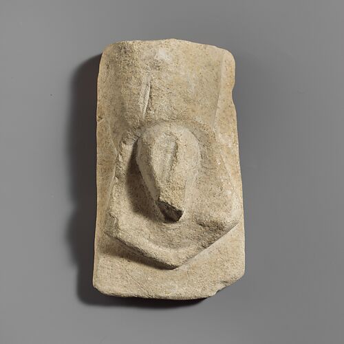 Stone votive relief of male genitalia