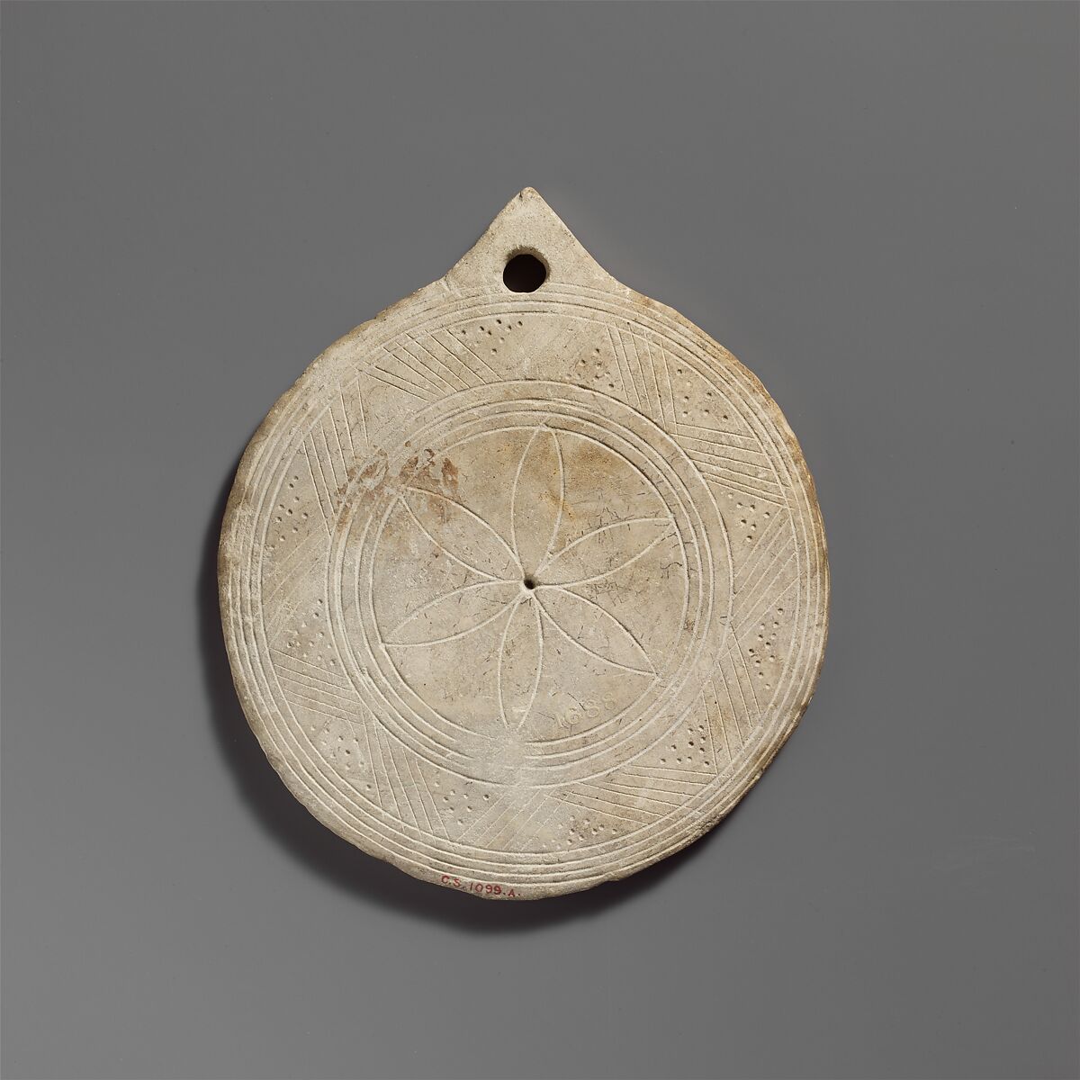 Limestone disk with geometric decoration, Limestone, Cypriot 