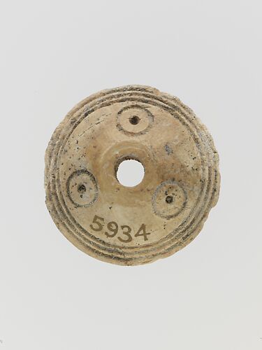 Bone spindle whorl