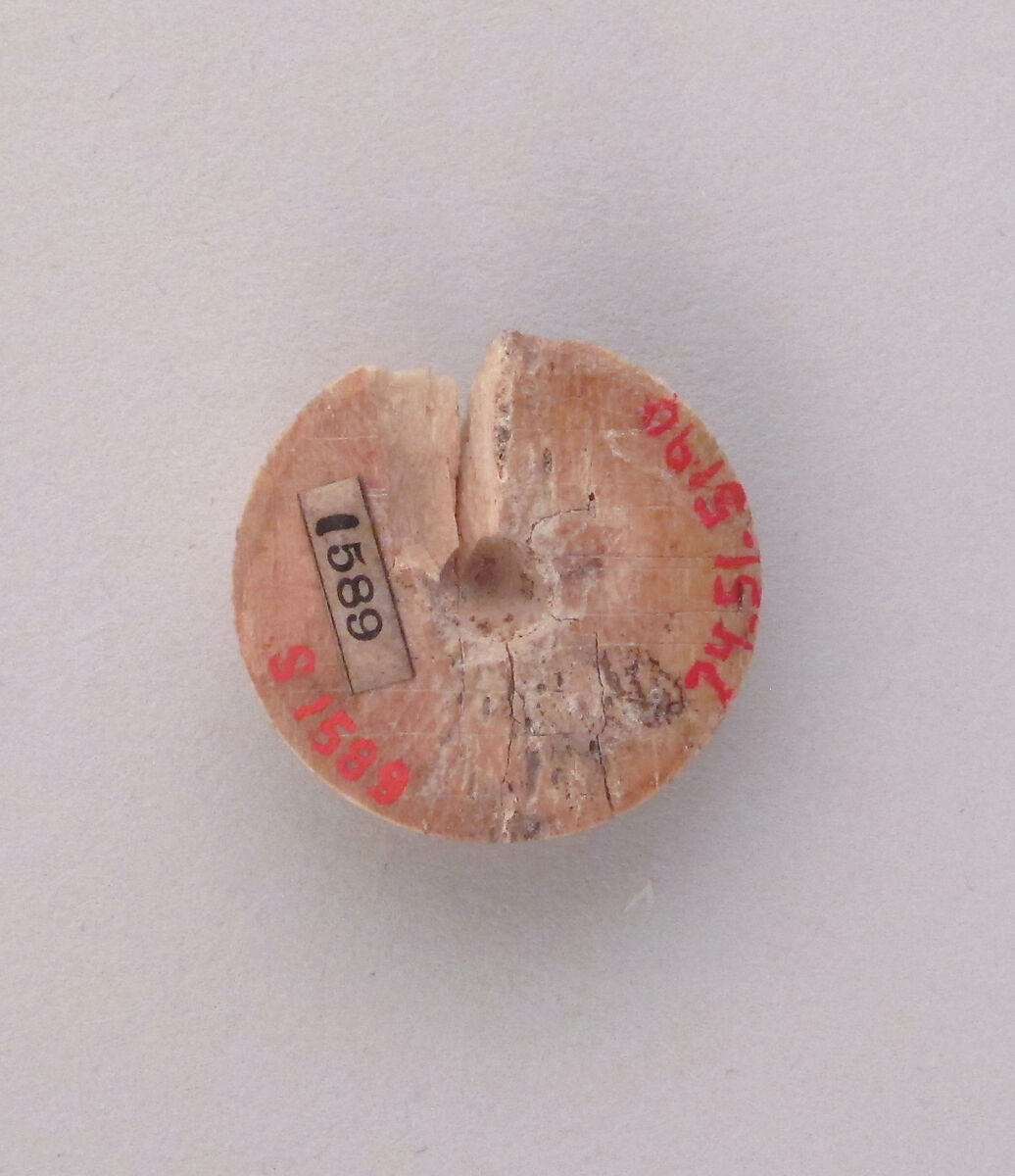 Semi-spherical disc with mortice, Bone 