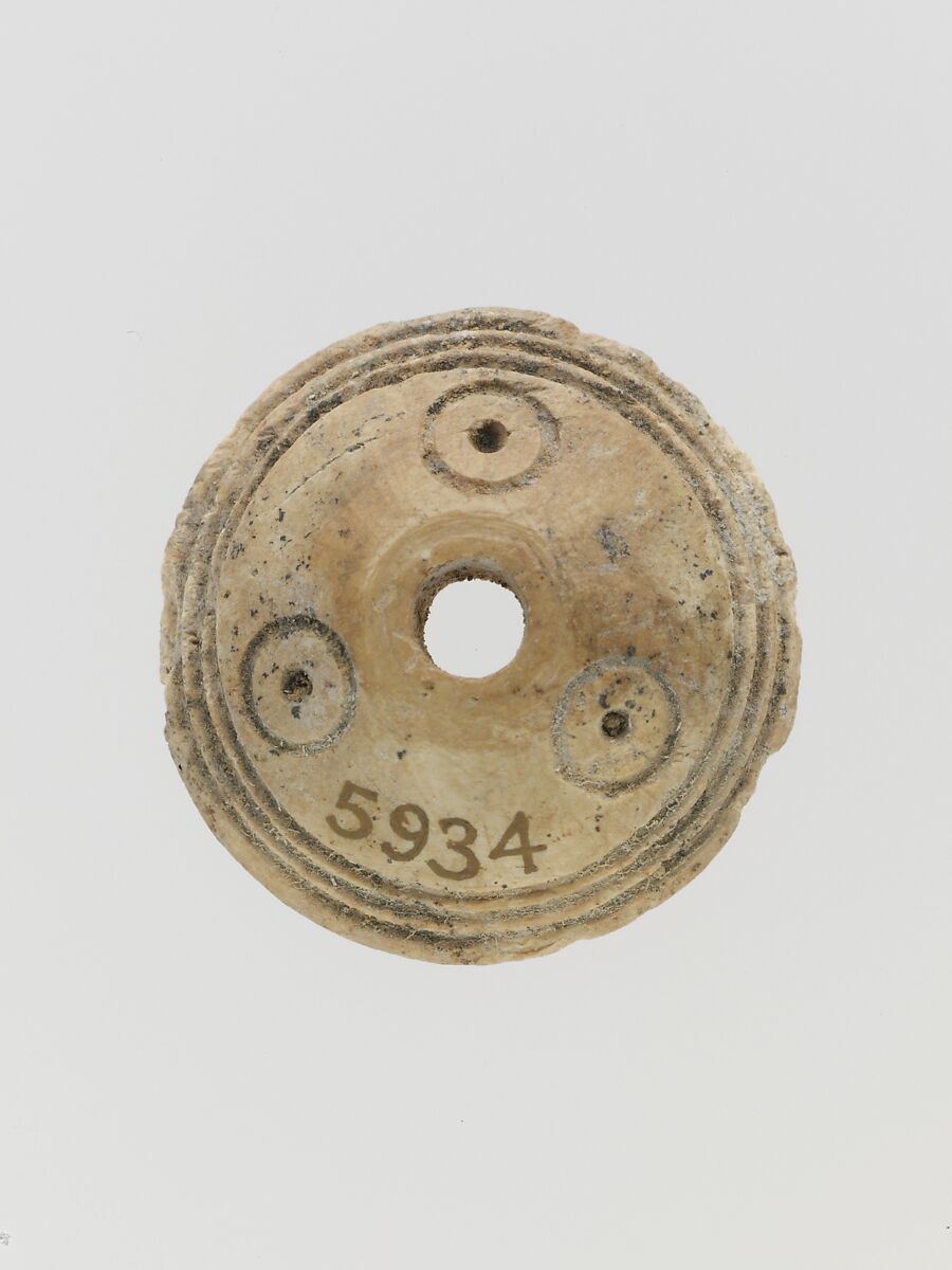 Bone spindle whorl, Bone, Cypriot