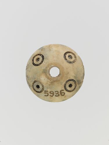 Bone spindle whorl