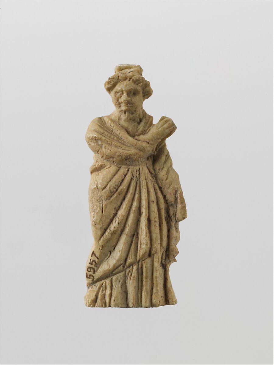 Bone statuette of a draped woman, Bone, Greek or Roman 