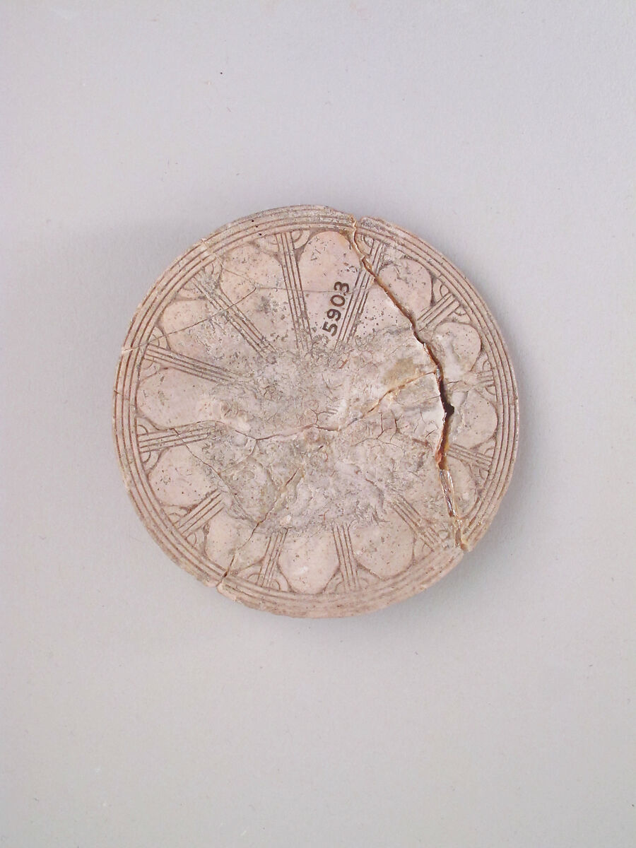 Ivory disk of a pyxis with a rosette, Hippopotamus ivory, Cypriot 