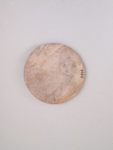 Ivory disk of a pyxis