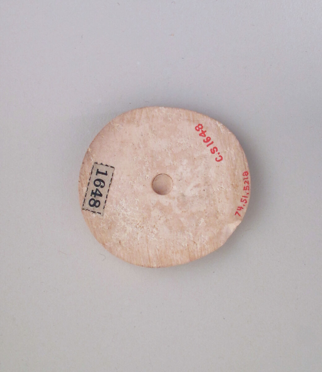 Ivory disk of a pyxis with rosette, Hippoptomus ivory, Cypriot 