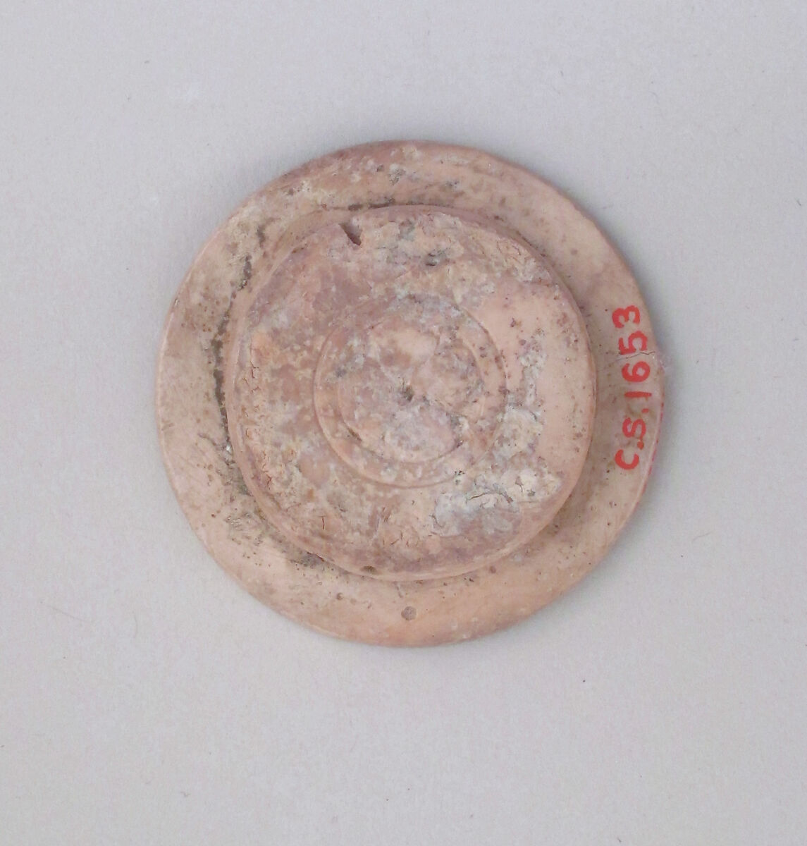 Ivory disk of a pyxis with rosette, Hippoptomus ivory, Cypriot