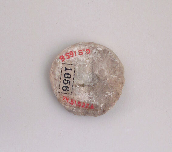 Ivory disk of a pyxis