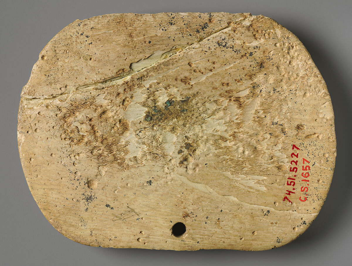Ivory plaque with a fallen human figure, Elephant Ivory, Cypro-Phoenician