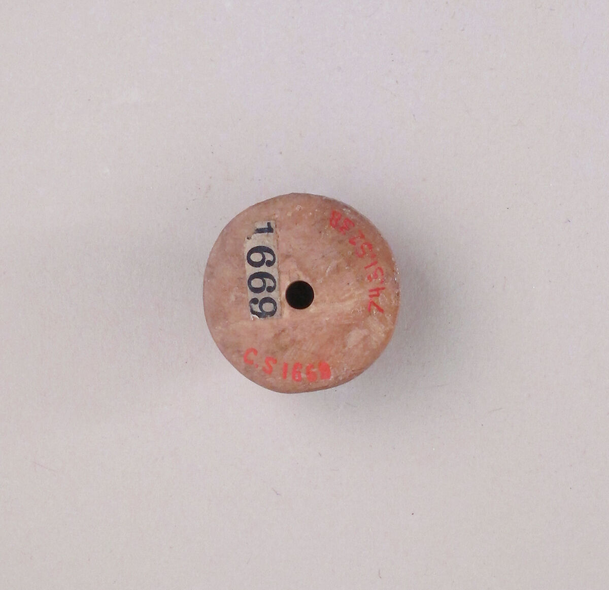 Ivory conical spindle whorl, Hippopotamus ivory, Cypriot 