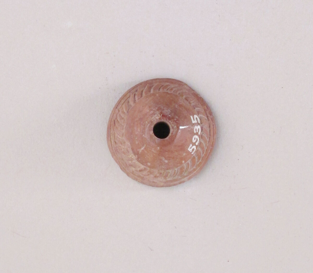 Ivory conical spindle whorl, Hippopotamus ivory, Cypriot