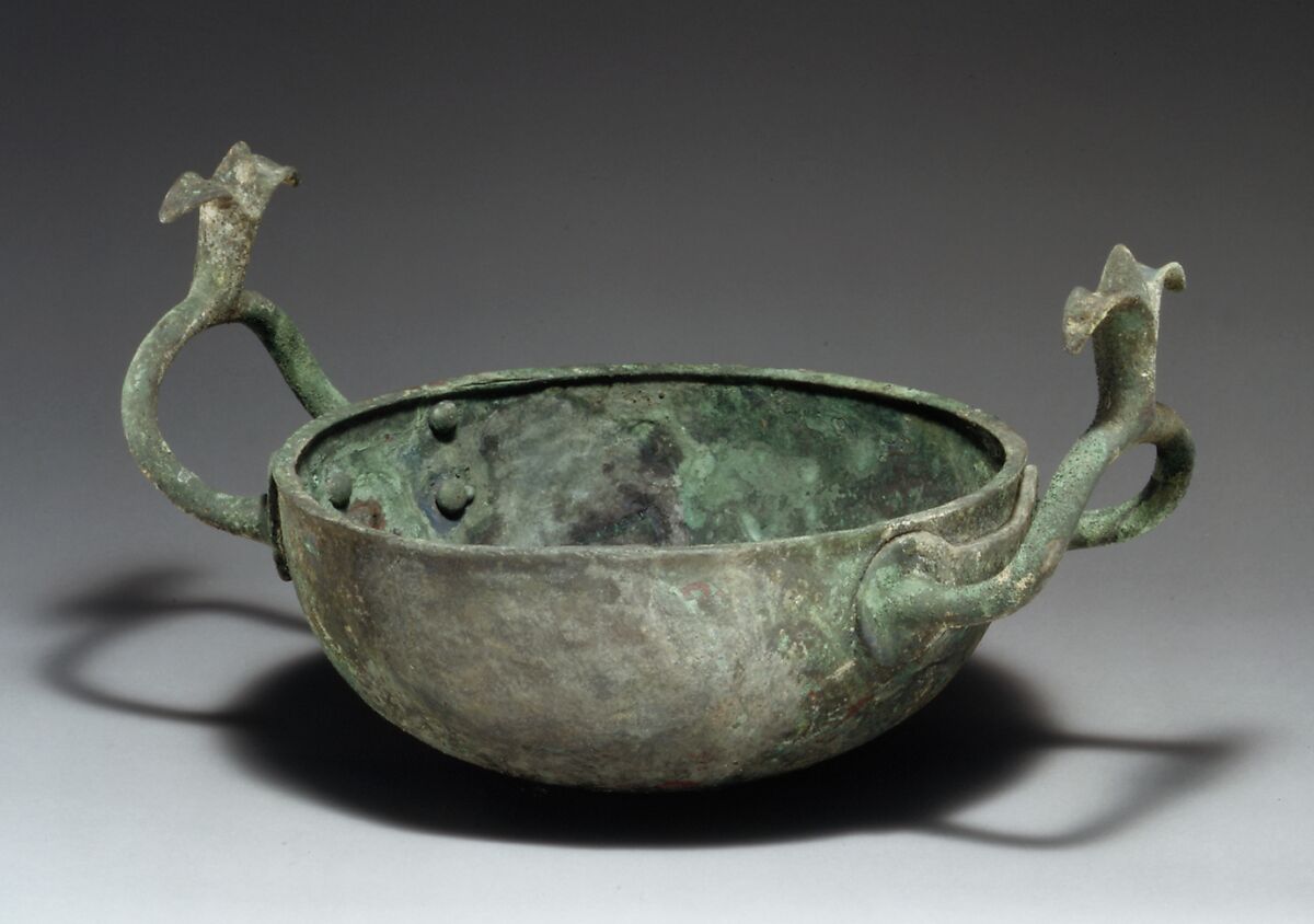 Bronze bowl with handles terminating in lotuses