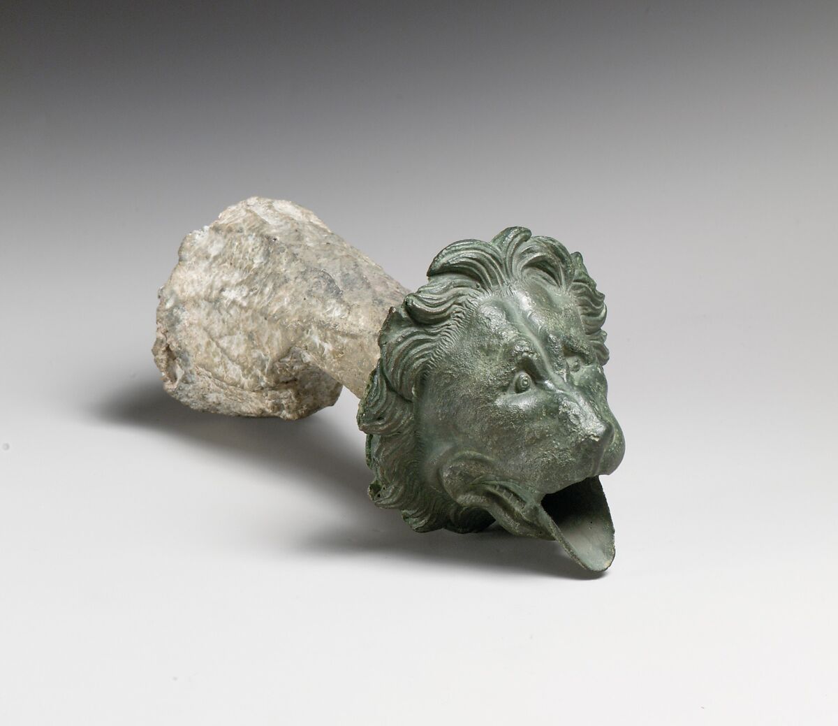 Bronze water spout with lion mask (one of a pair), Bronze, Greek or Roman