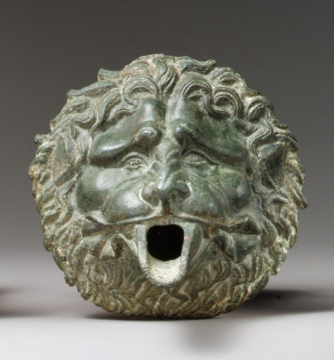 Bronze water spouts in the form of lion masks, Bronze, Greek or Roman