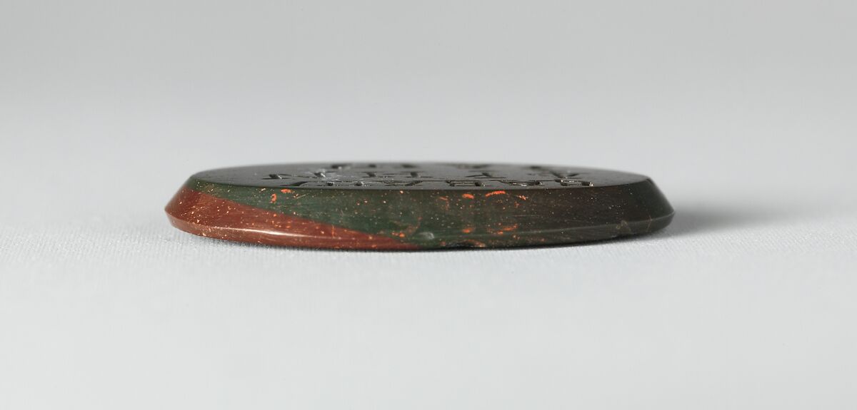 Jasper intaglio: Lion-headed god, Jasper, red and green, Roman