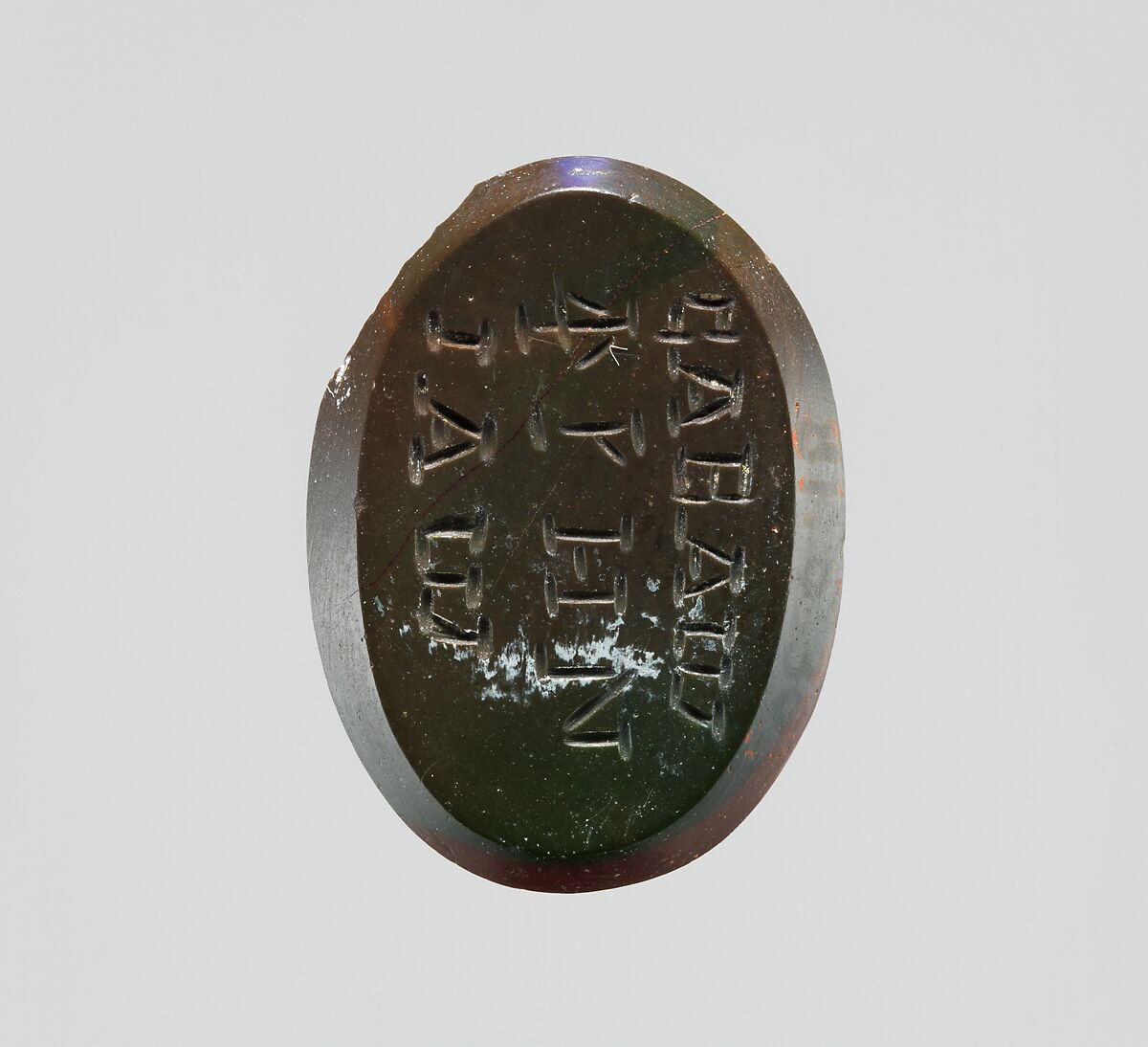 Jasper intaglio: Lion-headed god, Jasper, red and green, Roman