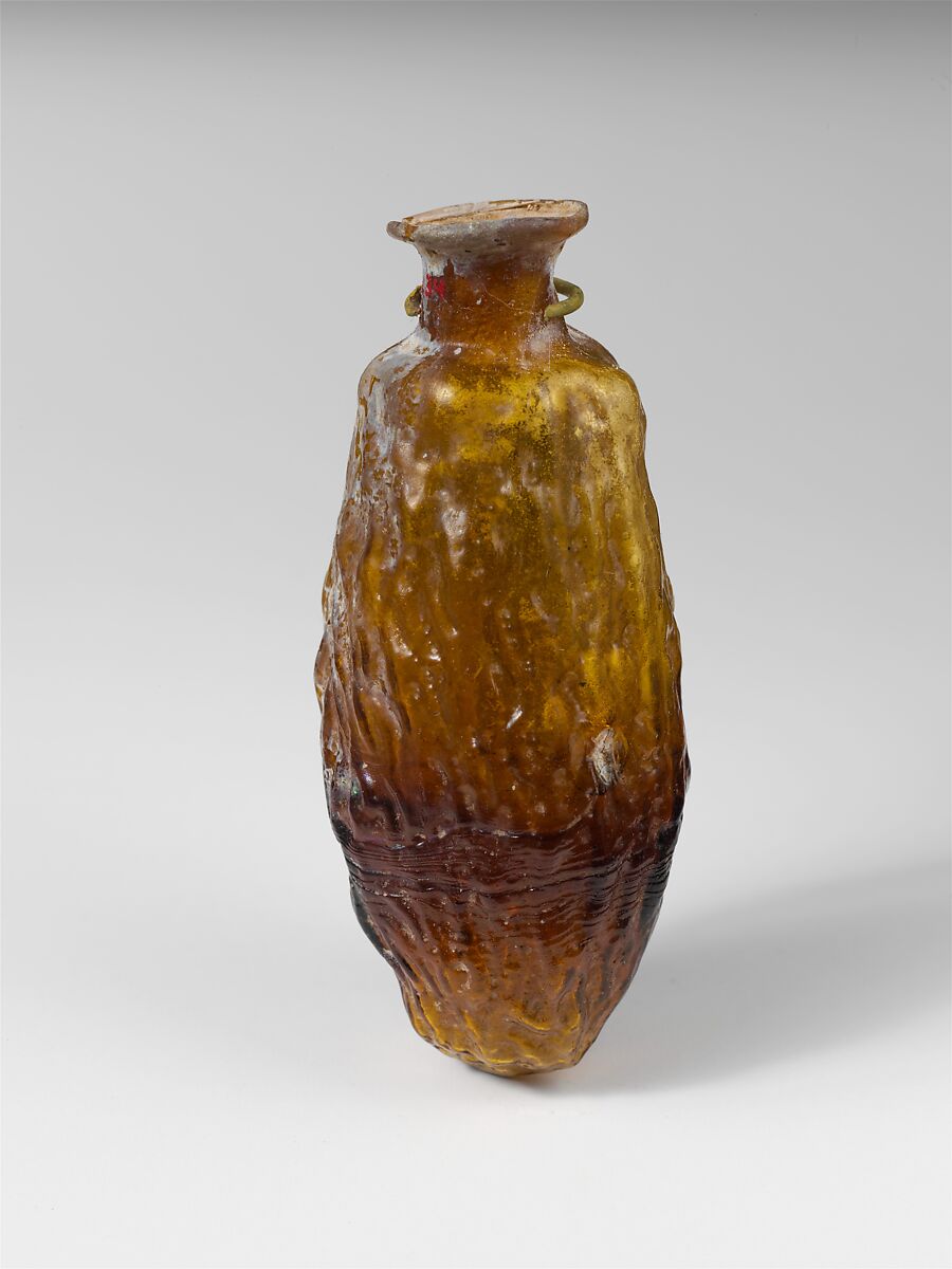 Glass bottle shaped like a date, Glass, Roman 