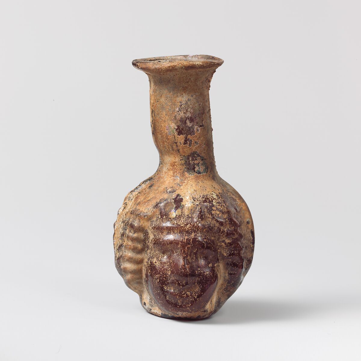 Glass double head-shaped bottle, Glass, Roman, Syrian 