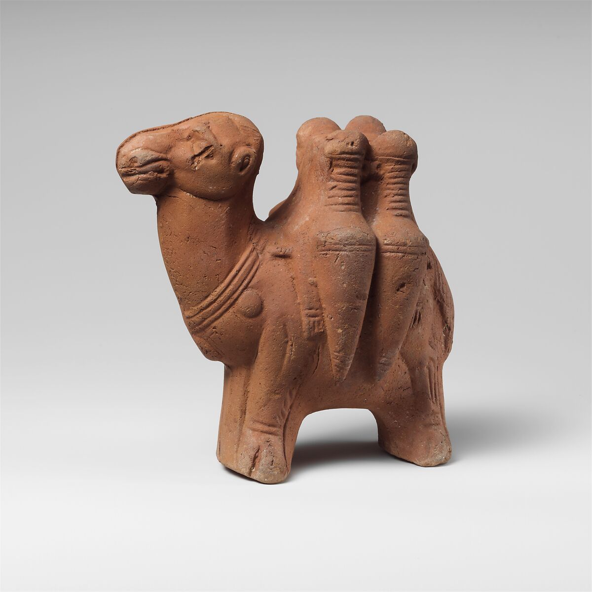 Terracotta figurine of a camel carrying transport amphorae, Terracotta, Roman, Egyptian 