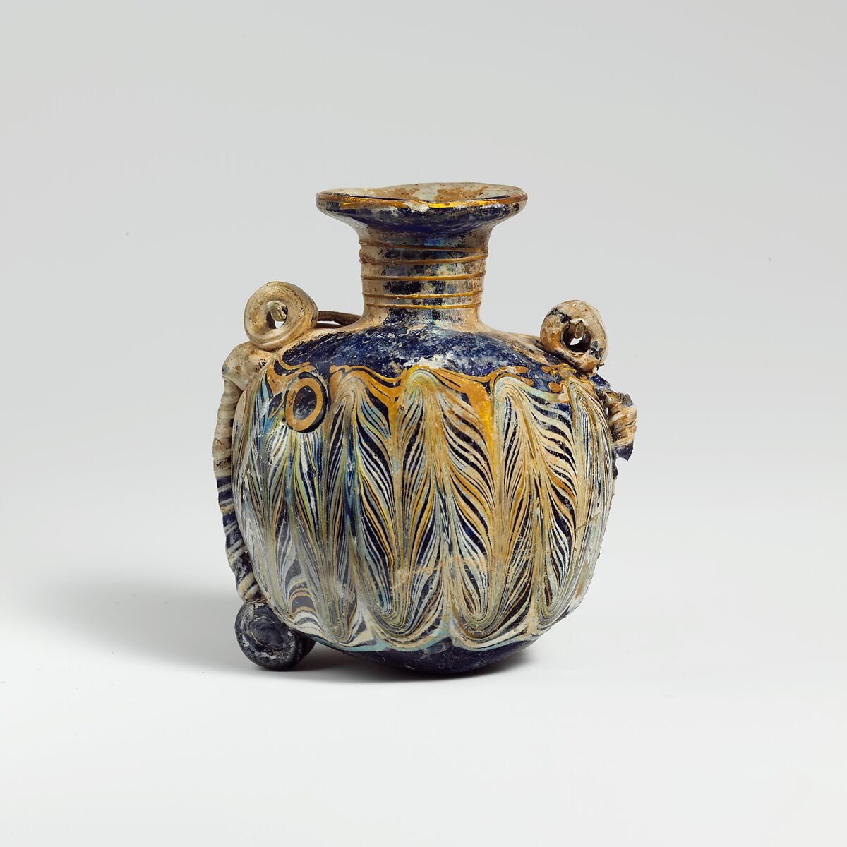 Glass lentoid aryballos (perfume bottle), Glass, Eastern Mediterranean or Italian