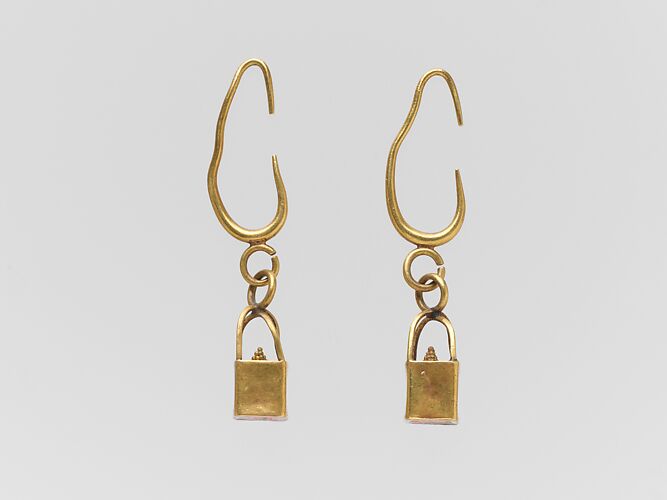 Pair of gold earrings with cage and ball pendants