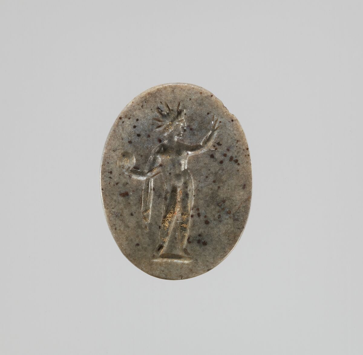 Hematite intaglio: Standing deity, Hematite, Roman 