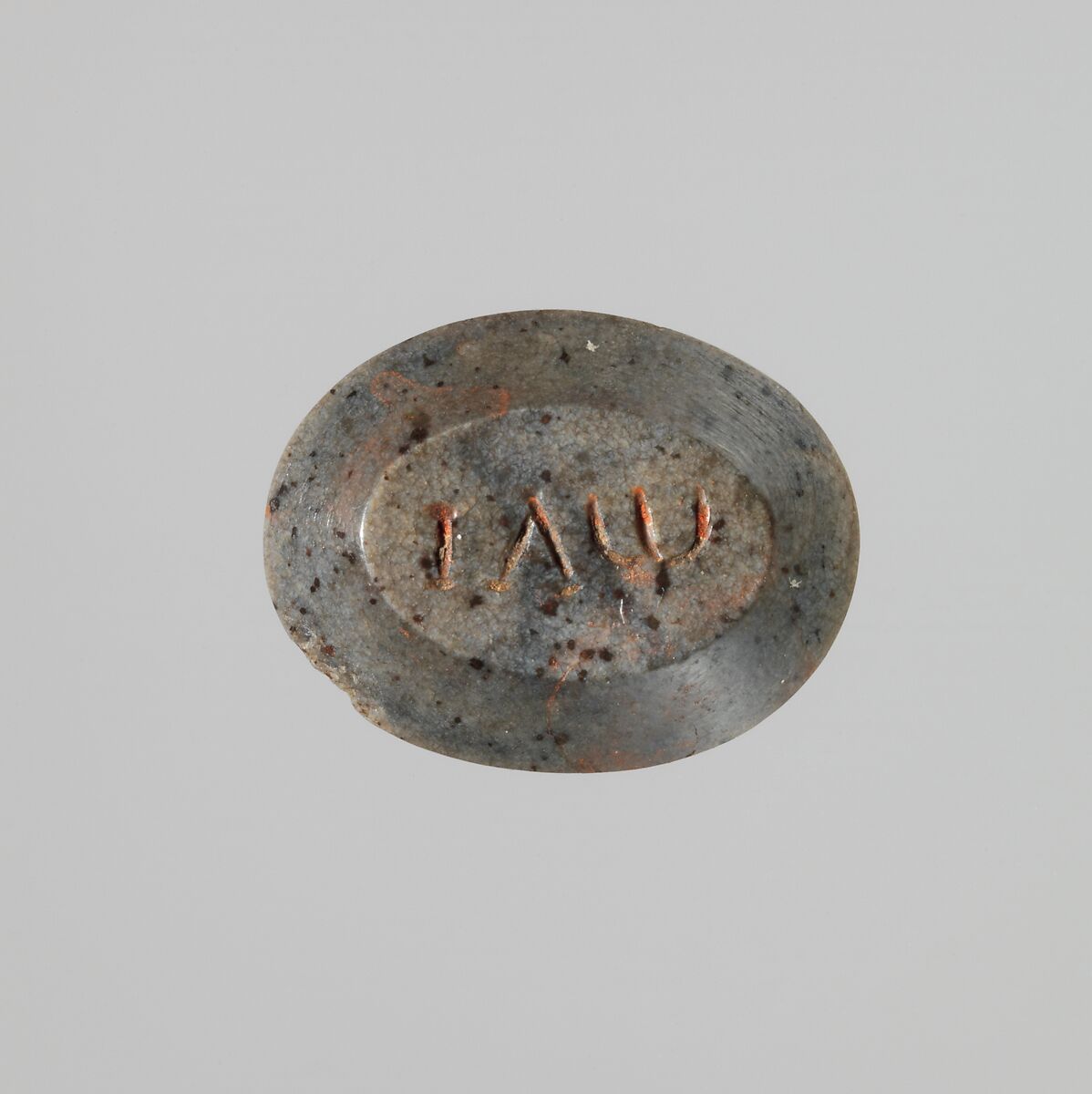 Hematite intaglio: Standing deity, Hematite, Roman