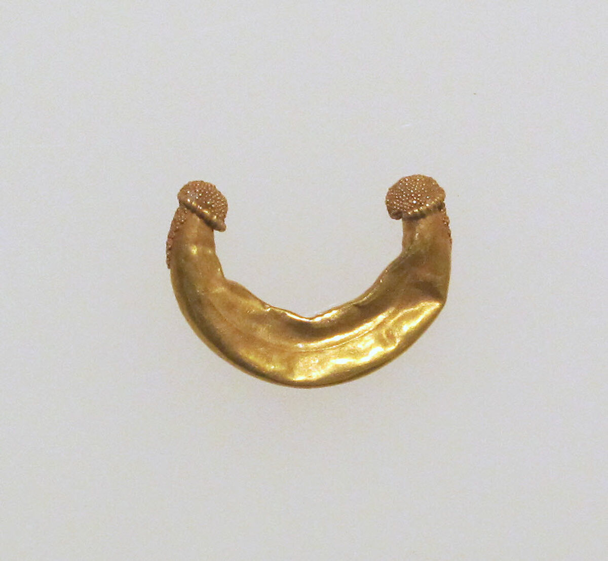 Earring, crescent-shaped | Etruscan | The Metropolitan Museum of Art