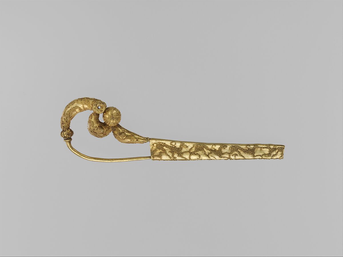 Gold serpentine fibula (safety pin) with animals in granulation, Gold, Etruscan 